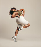 Woman expressing her self-confidence and self-assurance through dance