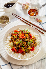 Wall Mural - crispy ground beef with stir-fried veggies in bowl