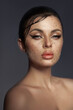 Beauty face woman makeup rhinestones lips. Contrasting portrait of a beautiful woman, wet hair styling. Clean facial skin