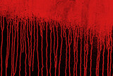 Fototapeta  - Red paint running down the black wall