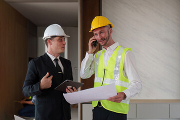 Civil Engineer team helmets hardhat on construction site and working together. Foreman industry project manager engineer teamwork. industry professional team