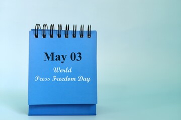 Wall Mural - May 3 as World Press Freedom Day date reminder on blue desk calendar. Celebration concept.	