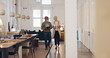 © Kay A/peopleimages.com - Elderly, creative business people and tablet walking in the office in project discussion, planning or corporate startup. Senior man and woman having a walk and talking in conference or boardroom