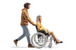 © Ljupco Smokovski - Full length profile shot of an african american man pushing a caucasian pregnant woman in a wheelchair