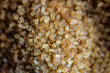 © ADDICTIVE STOCK - Detail of Brown textured sugar