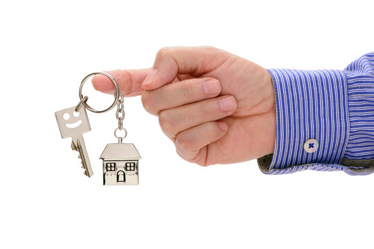 Fototapete - house key holding in hand