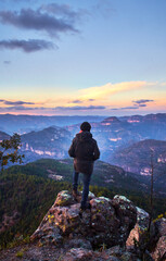 wanderer in front of a landscape with mountains at sunset, mexiquillo durango 