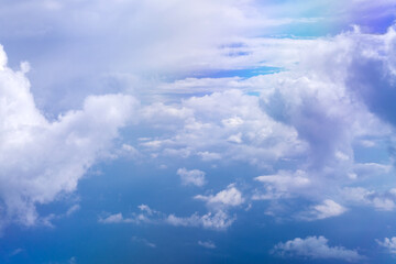 Wall Mural - Clouds view from the plane. Clouds are moving on camera. Flying through the cloud. Travel by air. Background