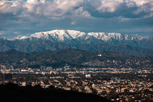 Los Angeles And Griffith Observatory With Snow-capped San Grabiel Mountains, Winter 2023