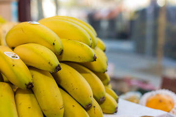 A bunch of bananas on display at a market