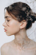 © Ananass - Stylish portrait of a young girl with gypsophila flowers and natural light, natural girlish beauty without makeup, minimalism and sophistication.