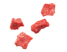 Pieces Of Raw Beef Meat Falling And Isolated On White And Transparent Background. Slices Of Cutted Red Meat, PNG