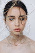 © Ananass - stylish portrait of a young 15-year-old model girl with natural light in a spacious photo studio
