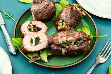 Wall Mural - Beef rolls with mushrooms and greens.