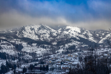 Wall Mural - View of the mountain village of Santo Stefano d'Aveto, in  wintertime, province of Genoa, Italy