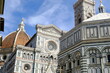 Cathedral square in Florence. Santa Maria del Fiore and Giotti's bell tower with blue sky.
