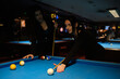 © DaliCeMedia - beautiful women playing pool