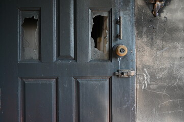 Wall Mural - burn dirty wood door texture background and broken glass