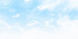 Light blue sky and white clouds. On a clear sky, floating clouds. Clouds white patterns on bright blue sky background
