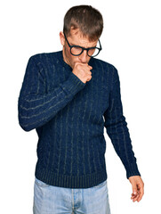 Poster - Young blond man wearing casual clothes and glasses feeling unwell and coughing as symptom for cold or bronchitis. health care concept.