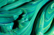 © ADDICTIVE STOCK - Mix of green and blue paint