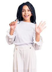 Sticker - Cute african american girl wearing casual white tshirt showing and pointing up with fingers number six while smiling confident and happy.