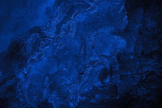 black dark navy blue texture background for design. toned rough concrete surface. a painted old buil