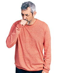 Canvas Print - Middle age hispanic with grey hair wearing casual sweater feeling unwell and coughing as symptom for cold or bronchitis. health care concept.