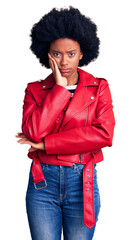 Sticker - Young african american woman wearing red leather jacket thinking looking tired and bored with depression problems with crossed arms.