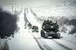 Generative AI illustration of a tank convoy on a snowy road