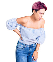 Poster - Young beautiful woman with pink hair wearing casual clothes suffering of backache, touching back with hand, muscular pain