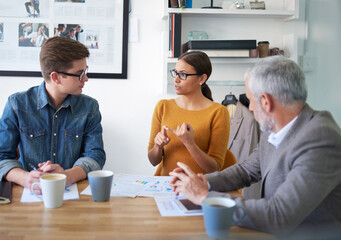 Poster - So this is what I think.... Shot of a group of coworkers brainstorming during a meeting.