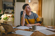© Miljan Živković - Young caucasian man teenager student study at home at the table night