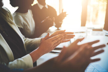 Canvas Print - Employee satisfaction is of utmost importance. Cropped shot of a group of businesspeople applauding a business presentation.