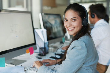 Aufkleber - Quality customer support is priceless. Portrait of a happy and confident young woman working in a call center.