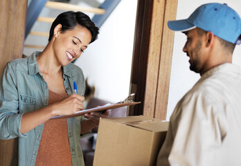 Aufkleber - Just sign and the package is yours. Shot of a young woman standing at her front door signing for a package from a courier.