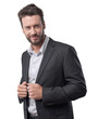© stokkete - Elegant young man adjusting his jacket