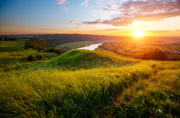 Photo Sur Toile - Colorful sunset and hilly meadow in golden evening light near Dniester river. Ukraine, Europe.