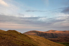 Wonderful Vibrant Sunset Landscape Image Of View From Latrigg Fell Towards Great Dodd And Stybarrow Dodd In Lake District