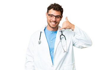 Wall Mural - Brazilian doctor man over isolated chroma key background making phone gesture. Call me back sign