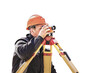 © Anoo - A worker in an orange helmet measures the level on a white isolated background. Geodetic measurements before embarking on major construction projects. Elevation mark in construction work.