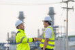 © reewungjunerr - Group Asian man petrochemical engineer working at oil and gas refinery plant industry factory,The people worker man engineer work control at power plant energy industry manufacturing