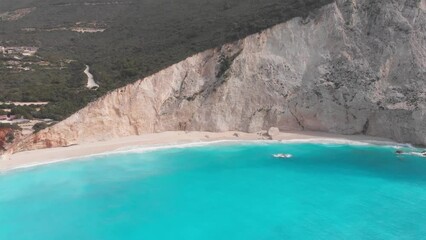 Wall Mural - Aerial view of beautiful empty beach in Greece, no people. Dramatic coastline scenic bay rocky cliffs in the Ionian island, Port Katsiki, Lefkada. Blue turquoise waving sea.