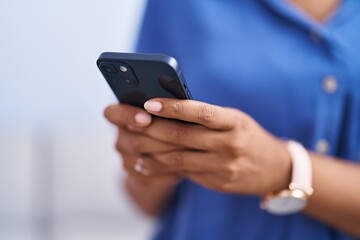 Sticker - African american woman using smartphone at home