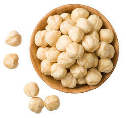 Wall Mural - Hazelnuts in the wooden bowl, isolated on the white background, top view.