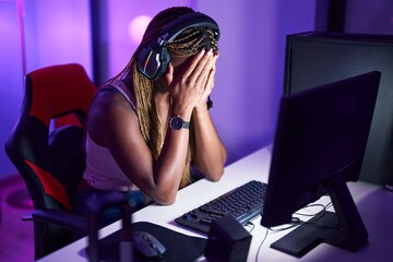 Poster - African american woman streamer stressed using computer at gaming room