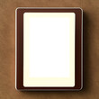 Photo frame with copyspace on a beige-brown background. Generative AI