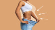 Young slim african american female in big jeans enjoy weight loss result with fat abstract body around, arrows
