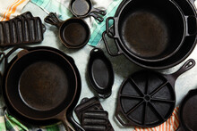 High Angle View Of Various Black Kitchen Utensils On Table At Home