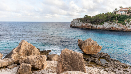 Wall Mural - Cliffs, beaches and coves in the south of the island of Mallocar in the Balearic Islands in Spain. Mediterranean coast.